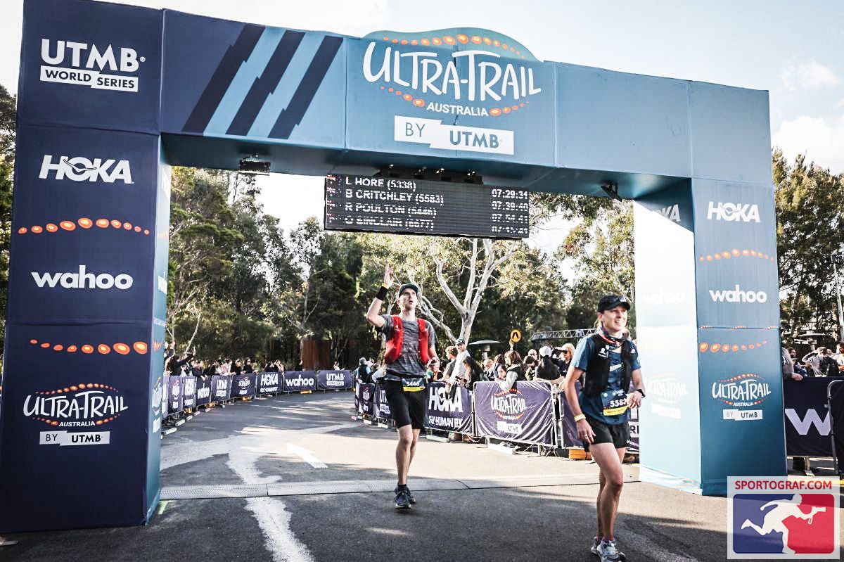 Waving to those lost and important to me. UTA50 Finish Line 2023 (Sportograf Images)